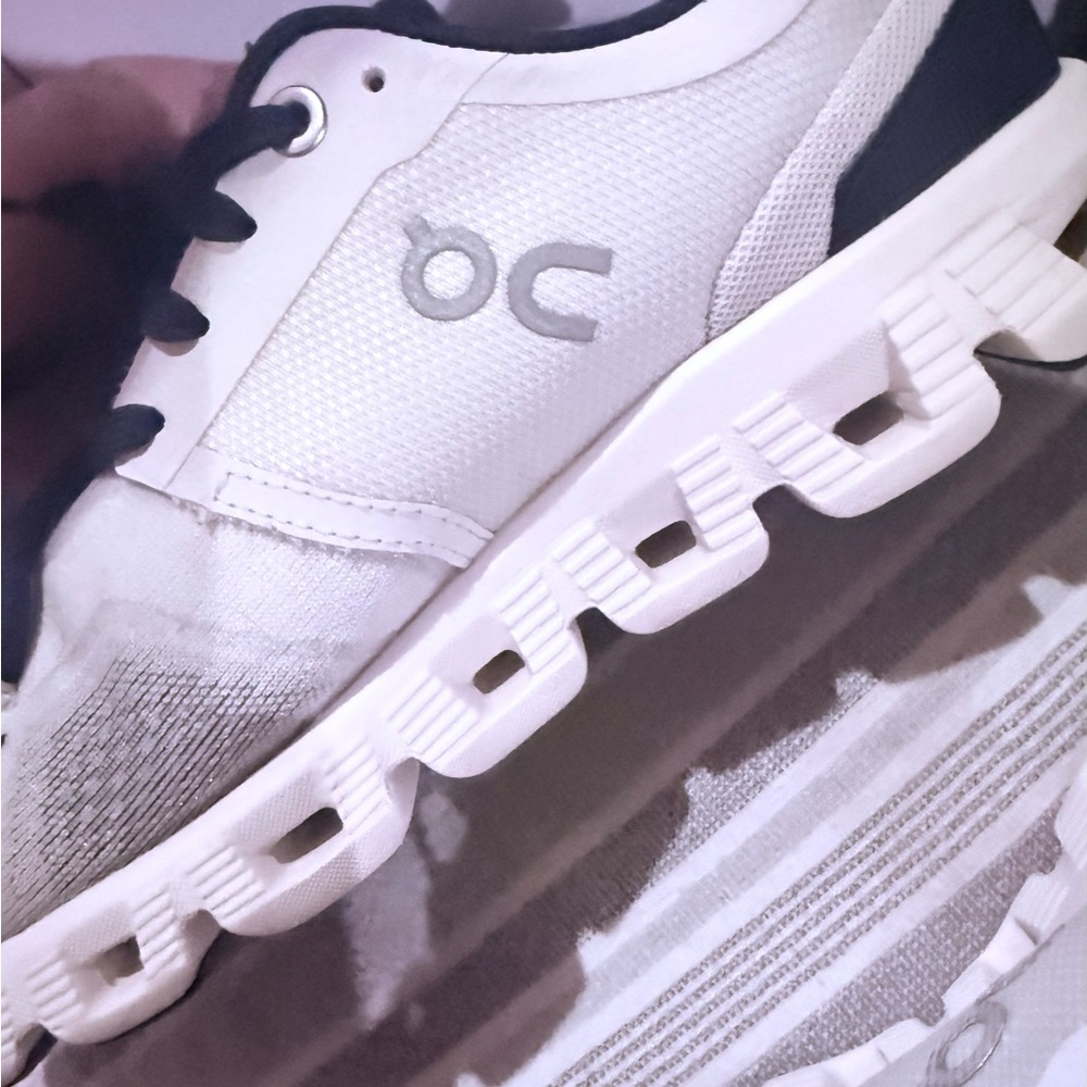 On Running White and Black Sneakers